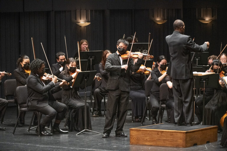 Joseph Wong playing violin