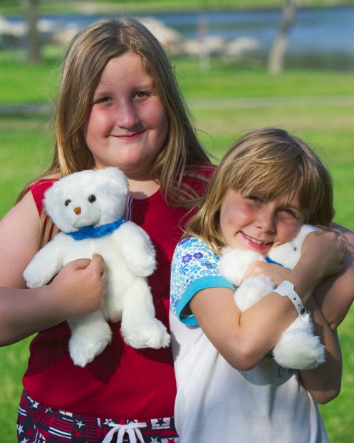 Rachel and Misha with their bears
