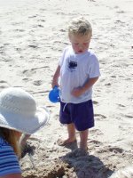 Timothy and Diana dig in the sand