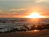 Sunset and Surf, low flare on water