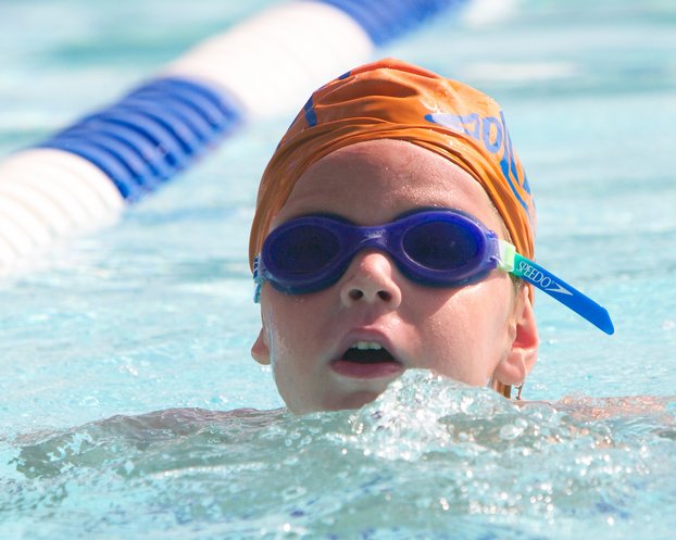 Timothy swims butterfly