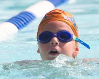 Timothy swims butterfly