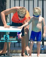 A coach shows Timothy where to start