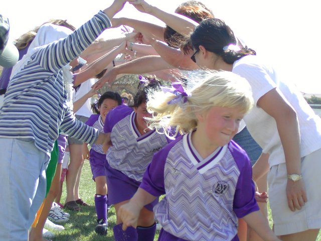 Running through the tunnel of arms