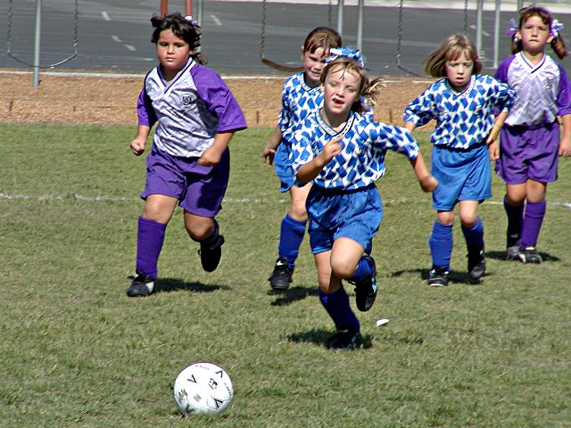 Vanessa tries to get the ball back