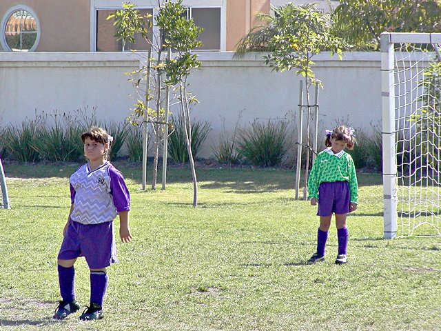 Vanessa and Kelsey defend the goal