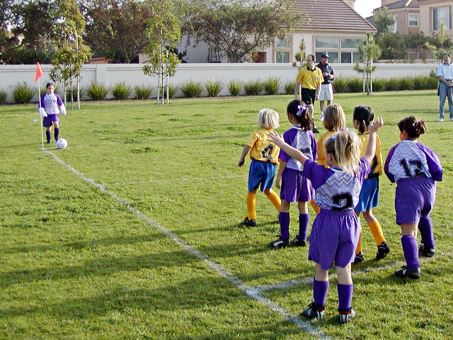 Alyssa does a corner kick