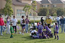 Dogpile on coach Brian