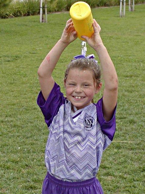 Natalie waters her head