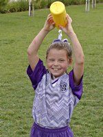 Natalie waters her head