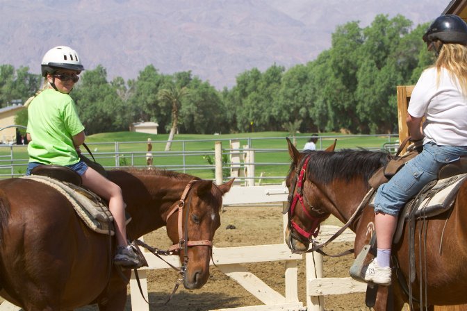 Sara and Diana head out for a one-hour horseback ride