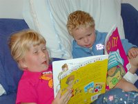 Sara reading to Timothy