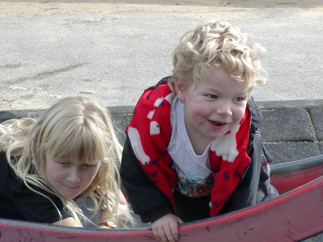 Sara and Timothy on the slide
