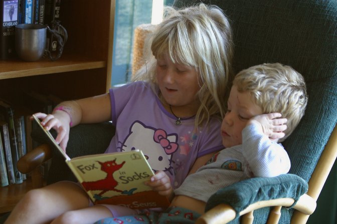 Sara reads to Timothy