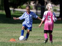 Sara defends against the 2nd quarter kickoff