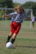 Dynamite player handles the ball