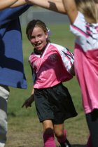 Katie runs through the tunnel