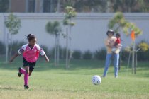 Walden's mother and brother watch her play