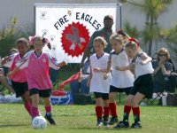 Play passes the Fire Eagles' banner