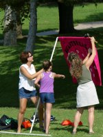 Raising the newly finished Heartbreakers sign