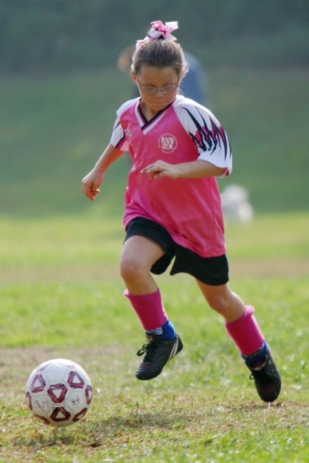 Natalie flies after the ball