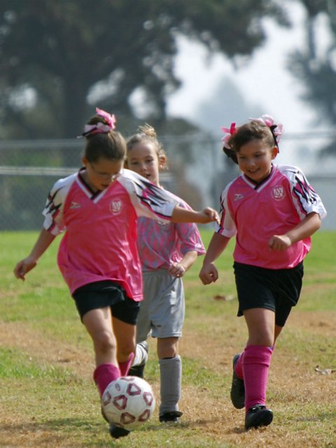 Natalie and Kelsey trailed by an Angel