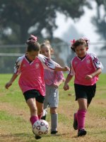 Natalie and Kelsey trailed by an Angel