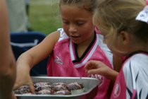 Chandler takes a cupcake