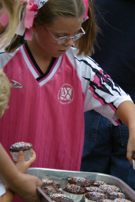 Natalie chooses her cupcake carefully