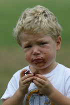 Timothy with cupcake on his face