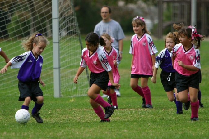 Maryam faces off against a puppy