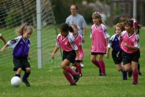 Maryam faces off against a puppy
