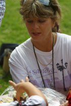 Debby handing out cupcakes