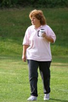 Coach Kathy arrives with her coffee
