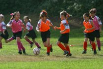 Kelsey takes on Tigers Alexandra and Kendal as teammates watch