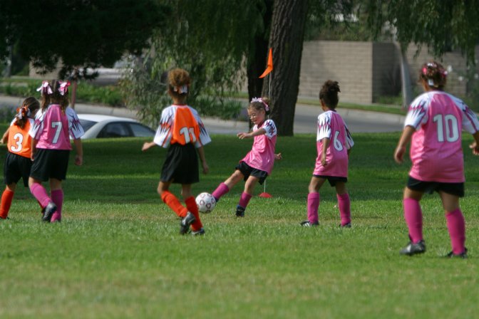 Natalie kicks the ball out of the corner