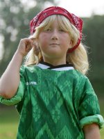 Sara with goalie jersey and red scarf
