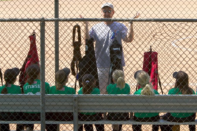 Coach John gives a pre-game pep talk