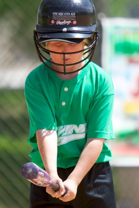 Sara measures her distance from the plate