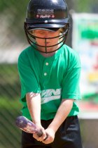 Sara measures her distance from the plate
