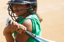 Ashley warming up with two bats