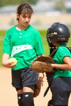 Breanna and Ashley have a conference at the mound