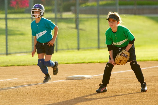 Brittany mans 3rd base while an Ice Breaker takes a lead