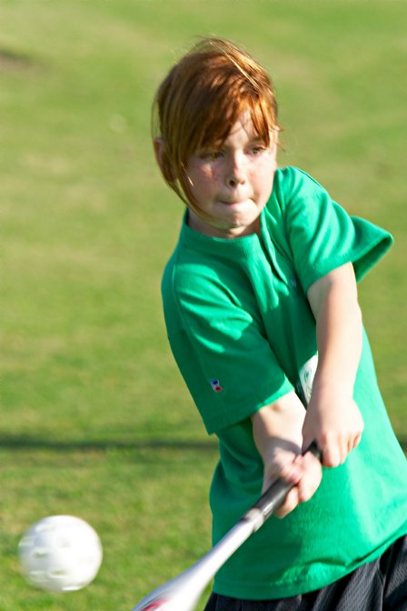 Kaitlyn batting whiffle balls