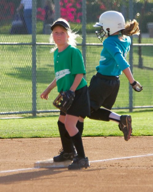 Sara waits for the throw at third