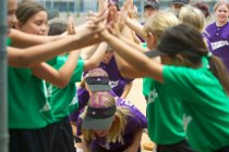 The Hot Shots cheer the returning winners