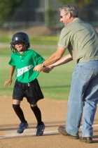 Coach John congratulates Jessica on her hit