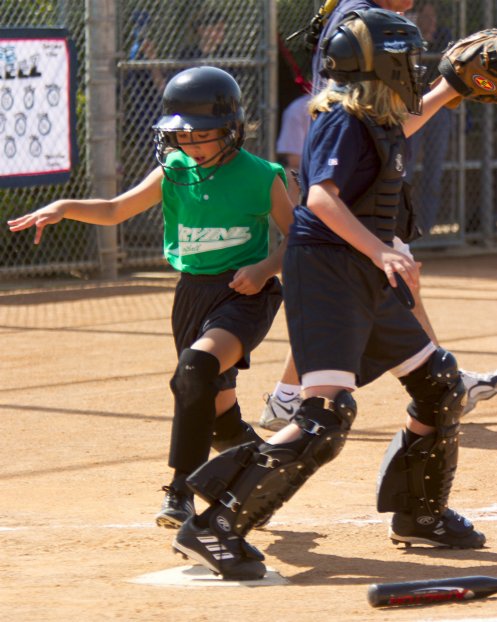 Kayla scores the first run of the season
