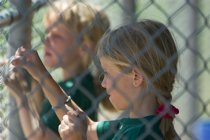 Annie and Sophie in the dugout