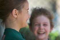 Elaine and Haley share a laugh in the dugout